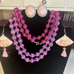 31. 2 purple bead necklaces and 2 earrings one pierced one clip
